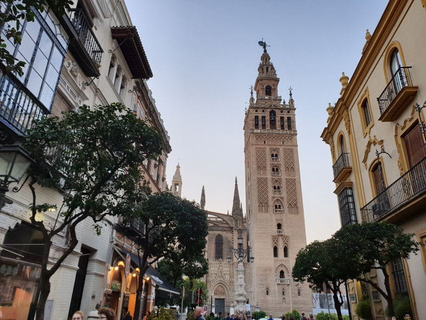 Seville: Tapas, Taverns, and History Walking Tour - Indulging in Traditional Andalusian Cuisine