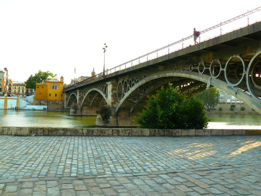Seville: Triana Legends Tour & Eco Cruise - Key Points