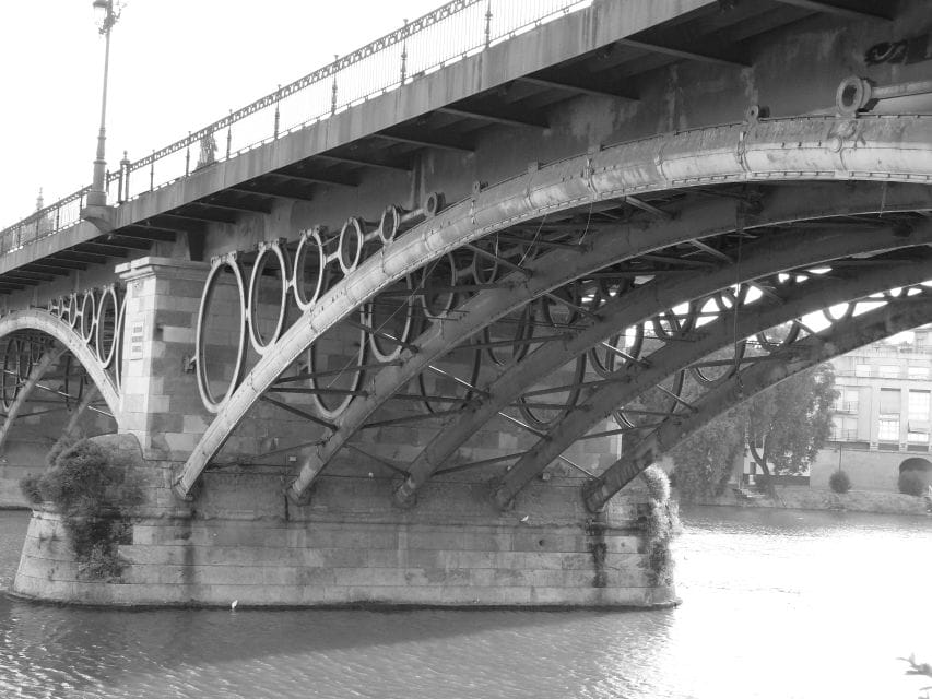 Seville: Triana Legends Tour & Eco Cruise - Itinerary Highlights