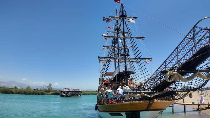 Side: Dolphin Boat Tour With Lunch Foam party Swimming - First Swim Stops: Refreshing and Fun