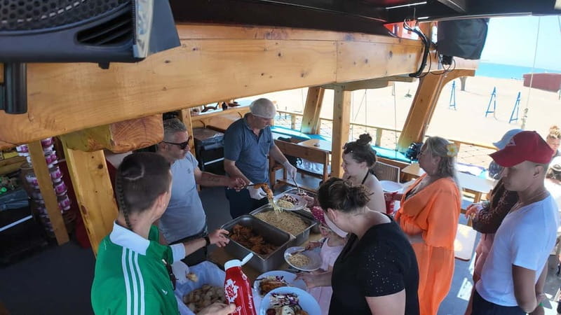 Side: Dolphin Boat Tour With Lunch Foam party Swimming - Price and Value