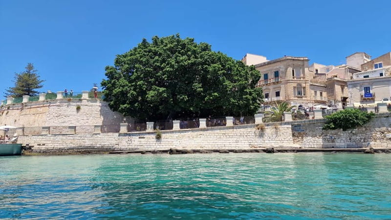 Siracusa: Wine tasting by boat with tour and gourmet food - The Experience in Detail: From Start to Sunset