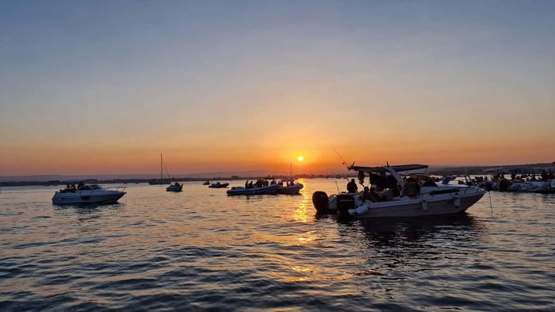 Siracusa: Wine tasting by boat with tour and gourmet food - Price and Value