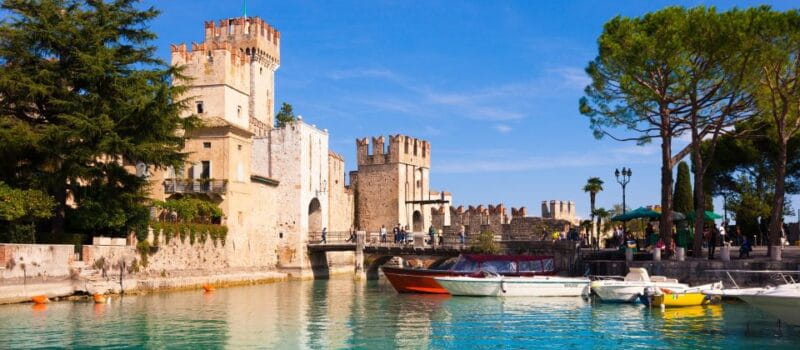 Sirmione: Walking and Speedboat Tour - Entering The Old Town: A Medieval Gem on Lake Garda