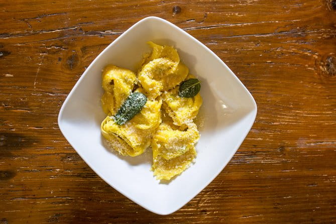 Small Group Market tour and Dining Experience at a Cesarina's home in Rimini - Who Should Book This Experience?