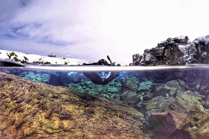 Snorkeling Between Continents in Silfra With Photos Included - Cancellation Policy and Refund Options