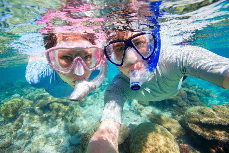 Snorkeling Tour Coast Taormina and Isola Bella - Entering the waters of Sicily’s coastline