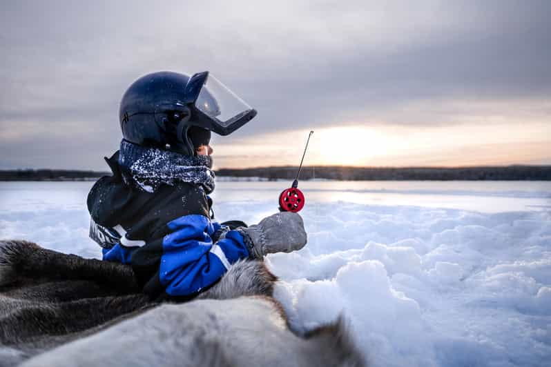 Snowmobile Safari with Ice Fishing Experience - The Food and Warmth of a Campfire