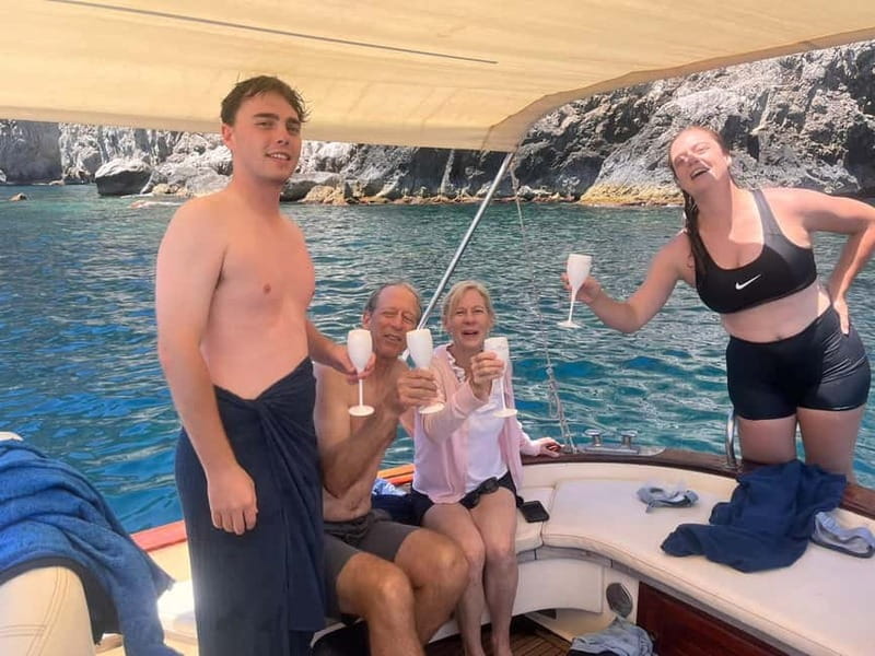 Sorrento Sunset Cruise with Aperitif on Board - Historical Highlights: Bagni della Regina Giovanna