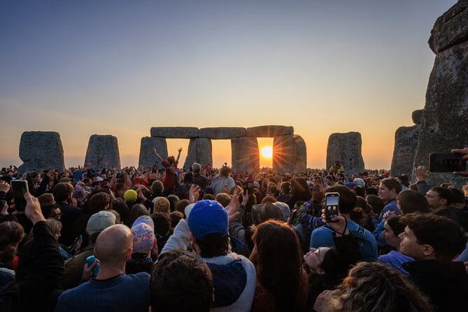 Stonehenge Summer Solstice Tour from London: Sunset or Sunrise Viewing - The Experience at Stonehenge: Rituals, Crowds, and Awe