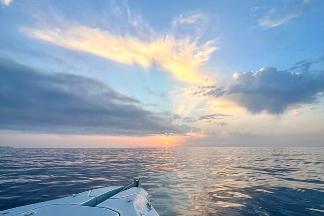 Sunset aperitif on the water - The Charm of Ile Rousse’s Sunset Aboard Dolce Mare