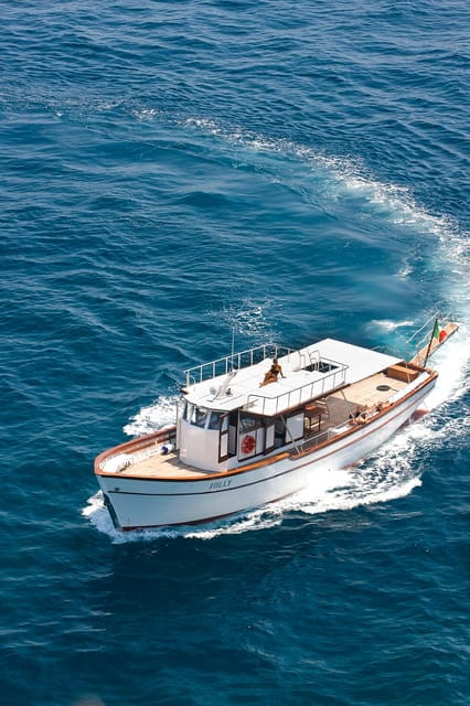 Sunset Dreams: Ischia by Boat with Aperitivo - The Return: A Nighttime View of the Castles and Cliffs