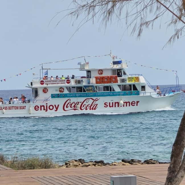 Sunset trip with swim stop at blue lagoon and turtles bay. - A Sunset Cruise with Swimming, Champagne, and Coastal Views in Cyprus