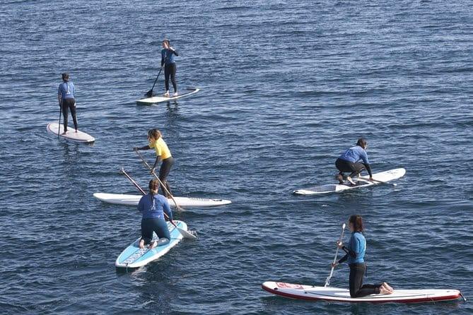 Sup Experiences in the ocean - The Yoga on the Water: A Serene Start
