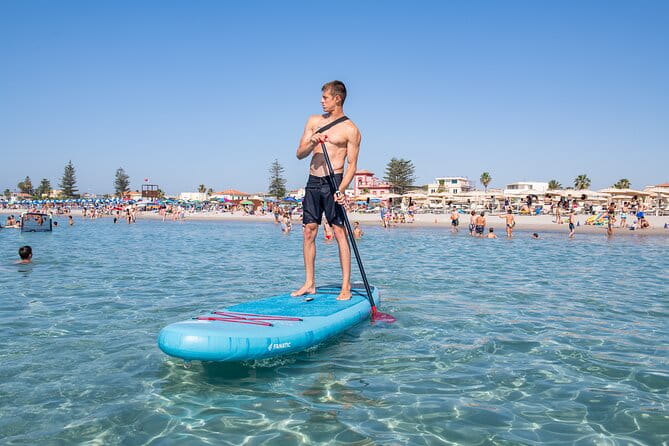 SUP tour in the crystal clear waters under the Sella del Diavolo - FAQ about the SUP Tour in Sardinia