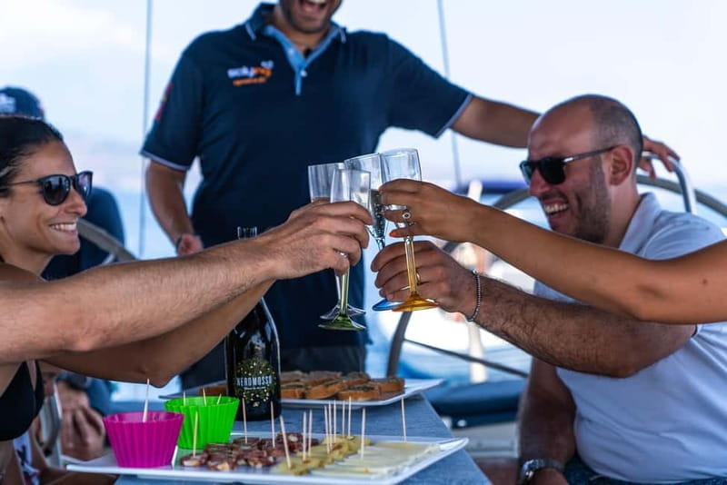 Taormina: Sailing boat tour with aperitif included - The Sum Up