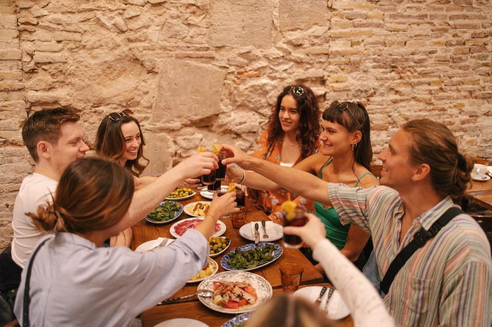 Tapas Dinner Party Food Tour With Guide - Experience Highlights
