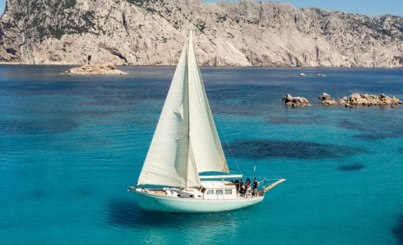 TAVOLARA TOUR WITH 15 METERS VINTAGE SAILBOAT WITH APERITIF - Navigating Sardinias Coastline with Style and Substance