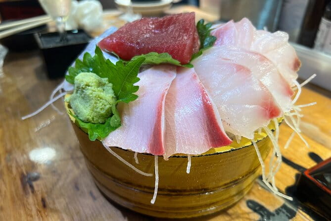 Tokyo: Shinjuku Food Tour (13 Dishes at 4 Local Eateries) - Tantalizing Dishes and Engaging Experiences