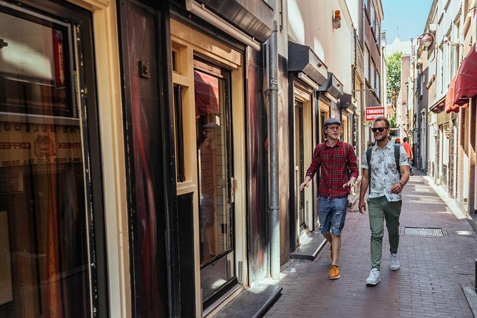Treasures of Amsterdam: Coffeeshops & Red Light District Private Tour - Confirmation and Accessibility