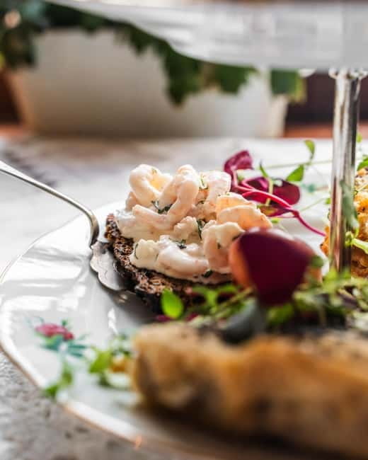 Turku: Afternoon Tea and Guided Walking and Boating Tour - Exploring Turku in Depth: Land and Water with a Taste of History