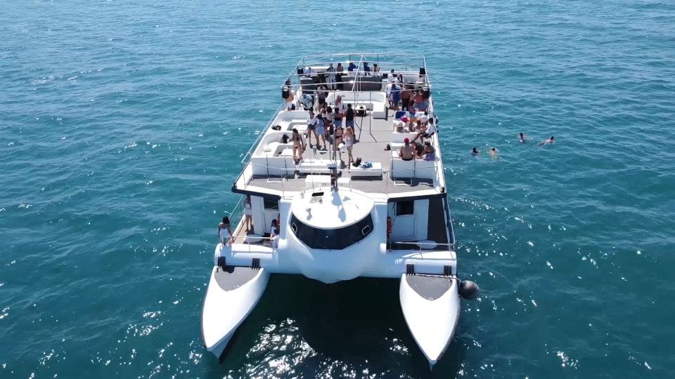 Valencia: Catamaran Cruise, Paella Lunch and Swim Stop - Activities and Highlights