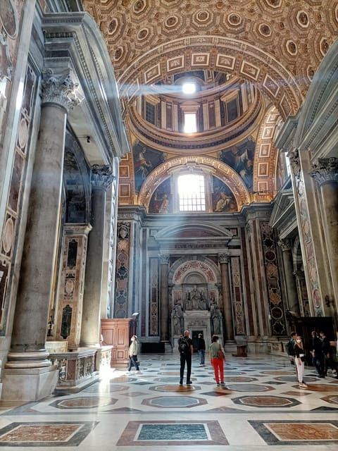 Vatican City: St. Peter's Basilica Audio Tour - Inside the Basilica: Art, Architecture, and Atmosphere