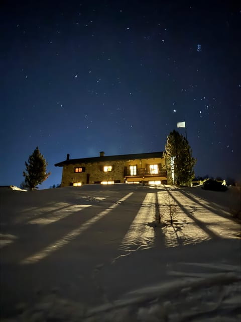 Vialattea: Night Snowshoeing under the Stars - Reaching Baita Gimont: Mountain Hospitality