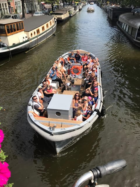 Visit Amsterdam by Boat with a French Guide (french) - Key Points / Takeaways