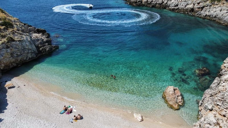 Vlore: Haxhi Ali Cave and Dafina Cave Speedboat Tour - Dafina Bay: A Hidden Beach and Cave Oasis