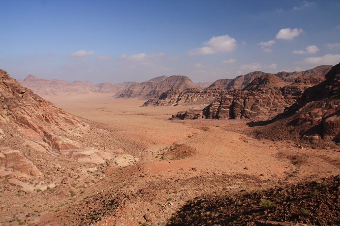 Wadi Rum: Mountain Hike With Lunch & Scenic Valley Tour - Four-by-Four Vehicle Adventure