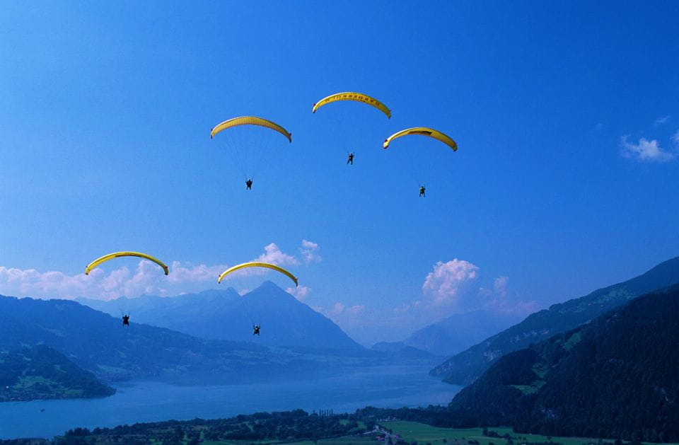 Zurich: Day Trip to Interlaken Incl. Tandem Paragliding - Free Time in Interlaken