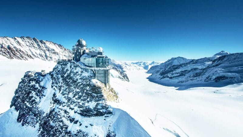 Zurich: Private tour to Interlaken, Grindelwald & Jungfrau - Grindelwald: A Picturesque Mountain Village